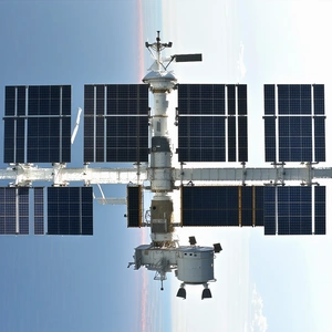 The Image Is A Unique Perspective Of A Space Station, Taken From The Inside Of The Spacecraft