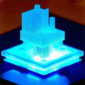 3d printer with blue light glow