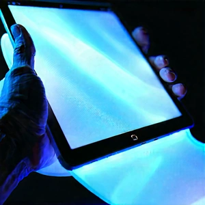 Tablet with glowing screen