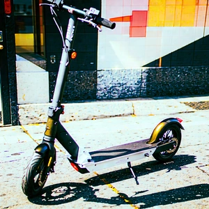 Urban Product Photography: City Electric Scooter In Arts District With Small, Two-wheeled