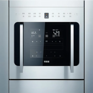 The image features a modern kitchen with a stainless steel oven and...