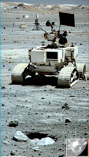 A White Robotic Vehicle Is Driving On A Rocky Surface