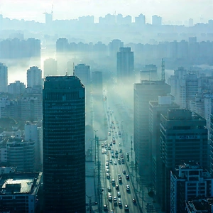 Urban Professional Photography: Cityscape Of Modern Metropolis During Foggy Morning With City Skyline