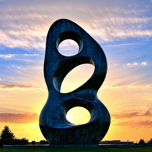 Urban Minimalist Design: Modern Sculpture With Sunset Glow With Large, Modern