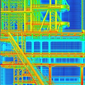 A Blue And Yellow Staircase Is Located In The Middle Of A Building